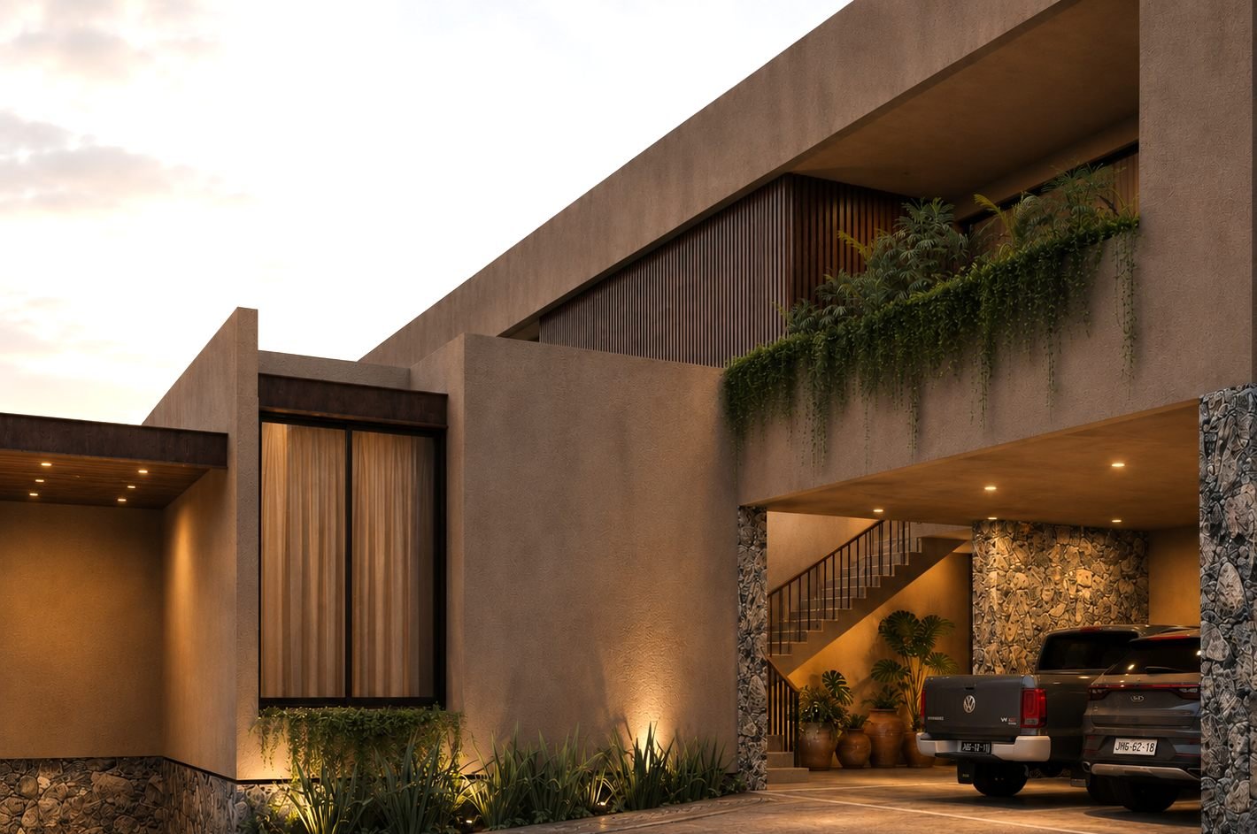 Fachada Casa Retama al anochecer